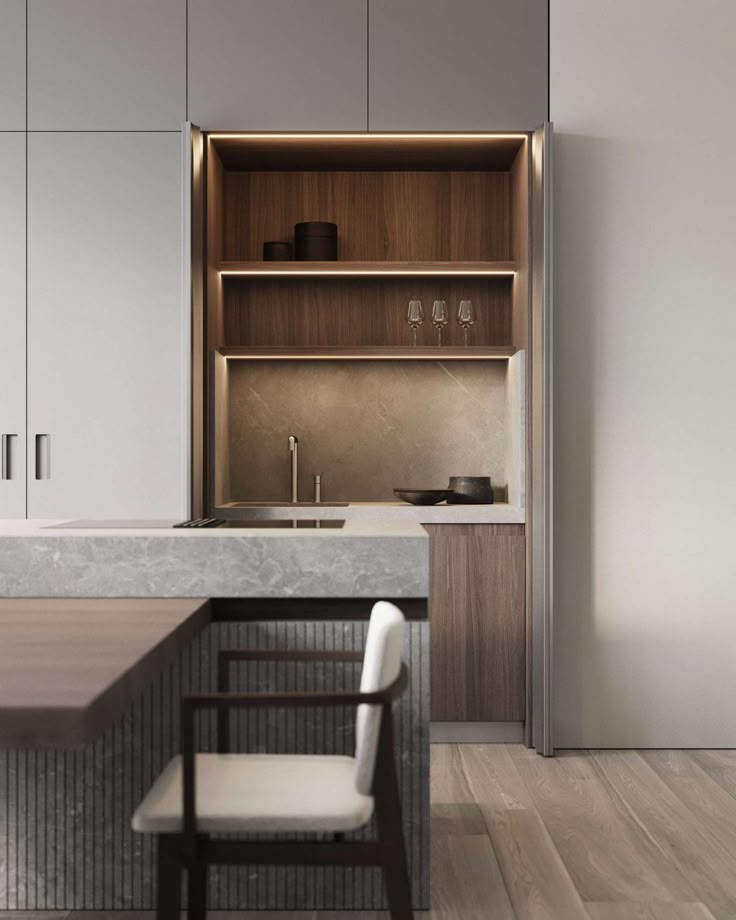 Modern kitchen featuring Blum pocket doors for concealed storage